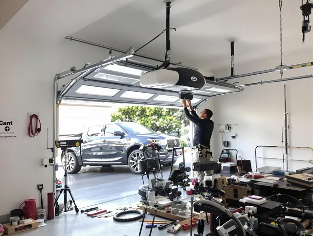 Long Beach Garage Door Repair specialist installing smart garage door opener system in Long Beach home