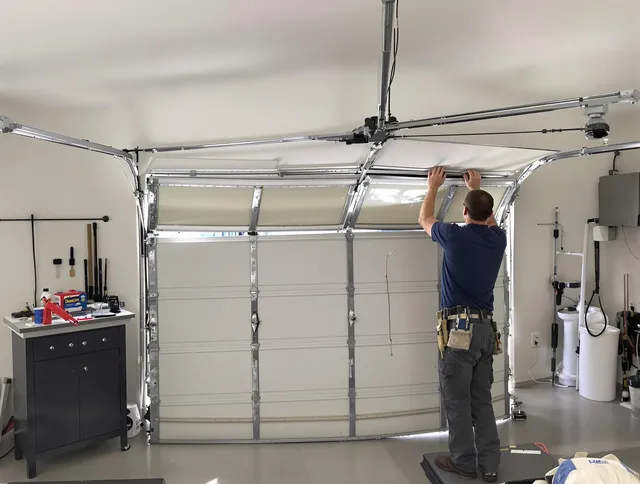 Long Beach Garage Door Repair specialist performing precise section replacement on Long Beach garage door