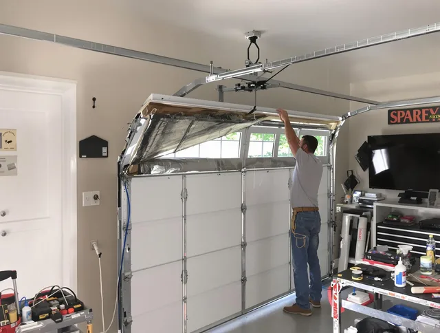 Garage door section replacement by Long Beach Garage Door Repair in Long Beach